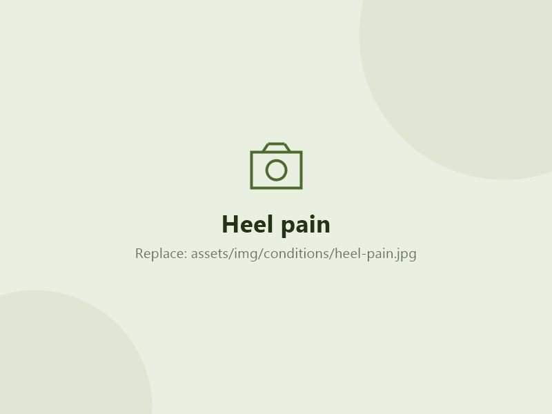 Person holding a painful heel
