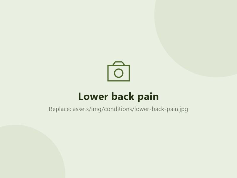 Person holding their lower back in pain